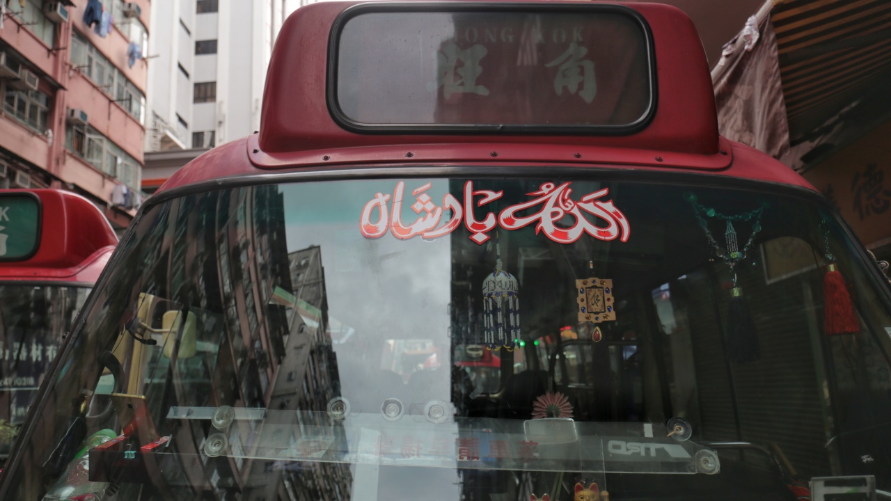 At the front of Jony’s Red Van, there is the sign “Allah” (Photo by Wong Wai Man)